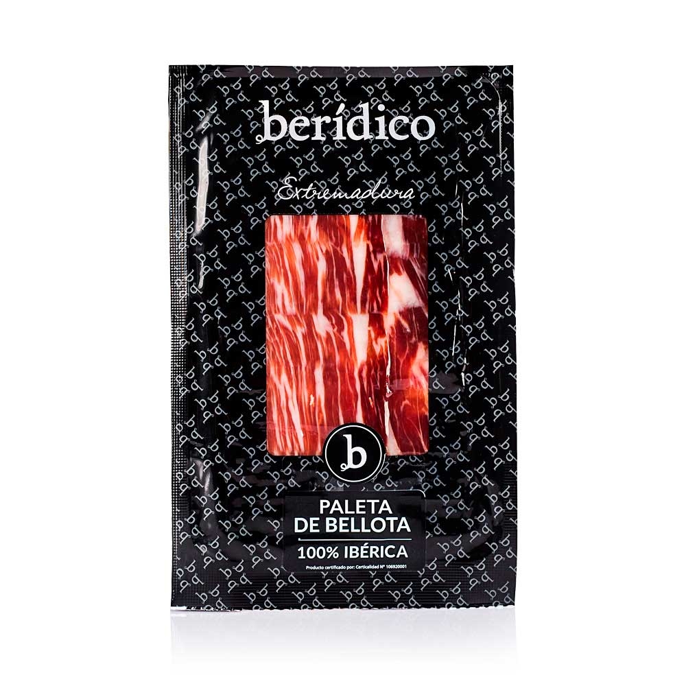 Paleta Ibérica de Bellota 100% cortada a mano y envasada al vacío, sobre individual.